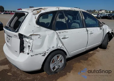 2009 Kia Rondo Lx z USA, uszkodzony, nr VIN KNAFG529X97263046